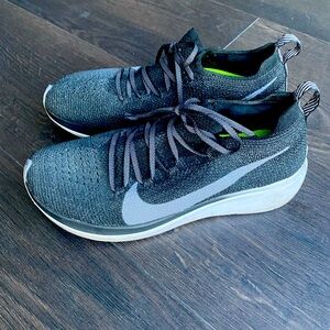 Black mesh Nike gym shoes. Size 7